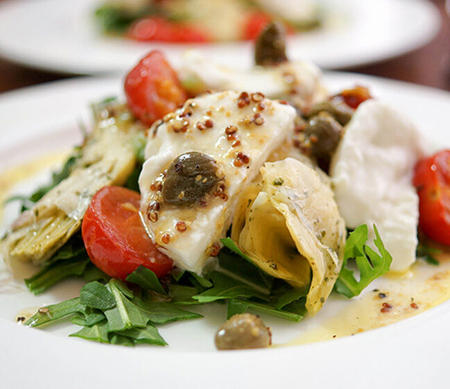 Roasted Cherry Tomato Salad with Artichokes and Bocconcini in a Lemon Caper Dressing