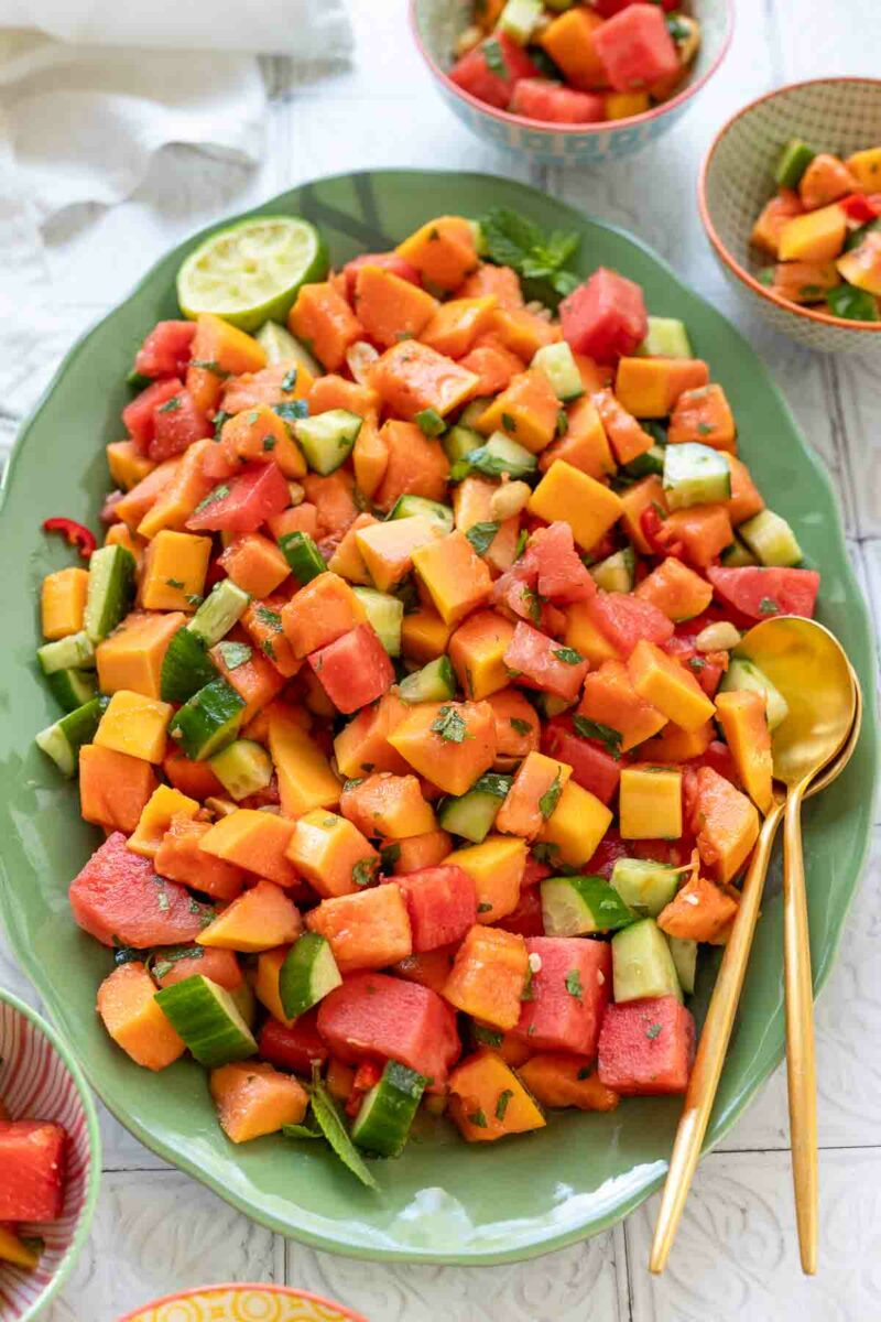 Chili Fruit Salad with Papaya, Watermelon, Cucumber, roasted peanuts, and fresh herbs recipe