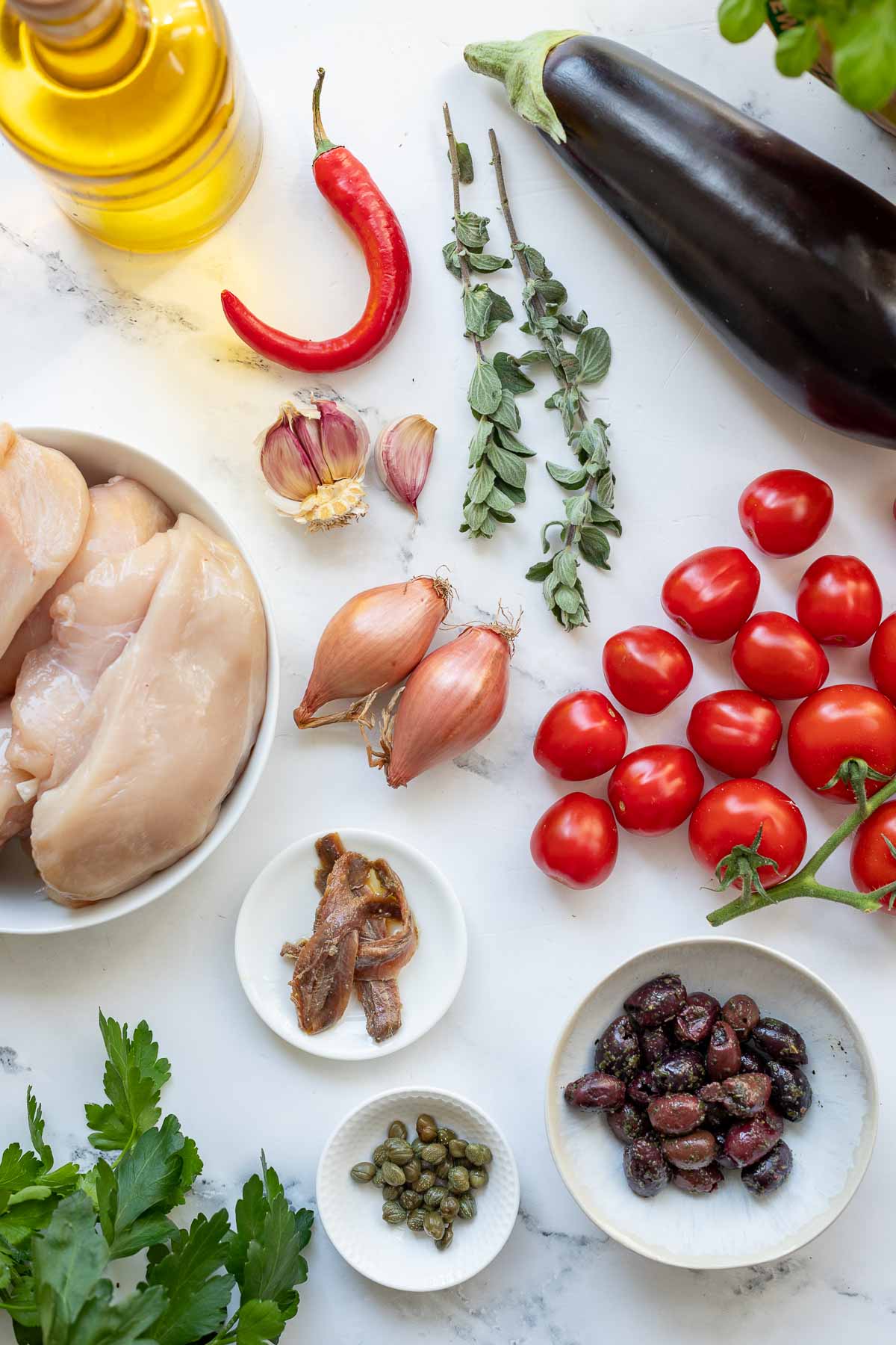 Zutaten für Hähnchen mit Aubergine alle Puttanesca