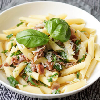 Pasta with Prosciutto and Arugula in a Lemon-Infused White Wine Sauce