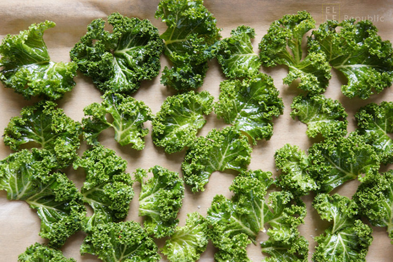 Spread kale evenly on baking sheet