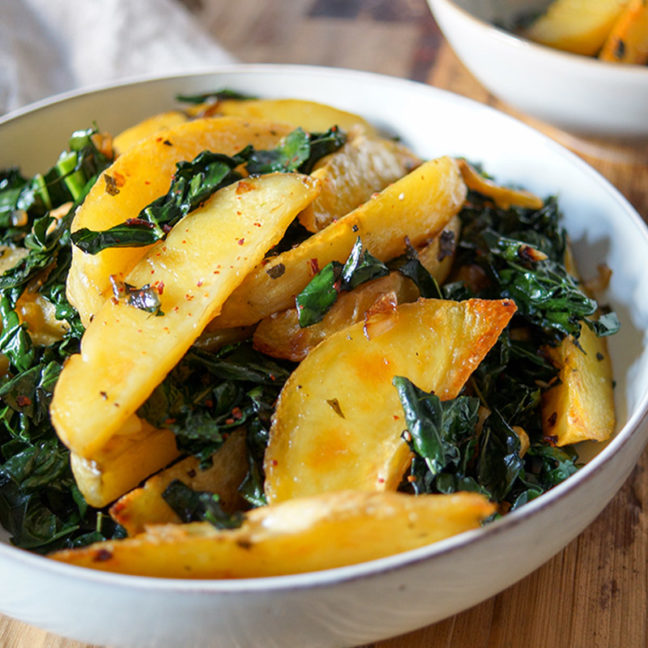 Sage Roasted Potato Wedges with Lacinato Kale Recipe served in bowl