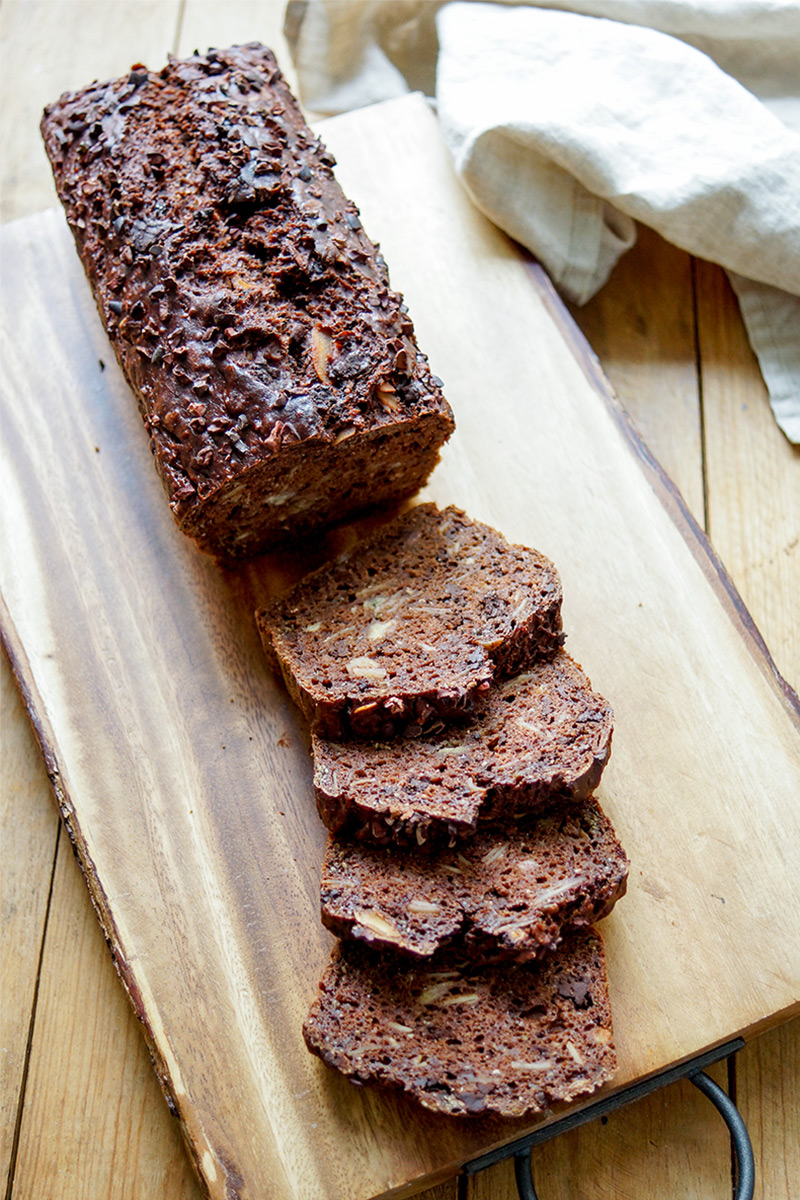Vegan double chocolate banana bread recipe with almonds, spelt flour and chia seeds. Refined sugar-free