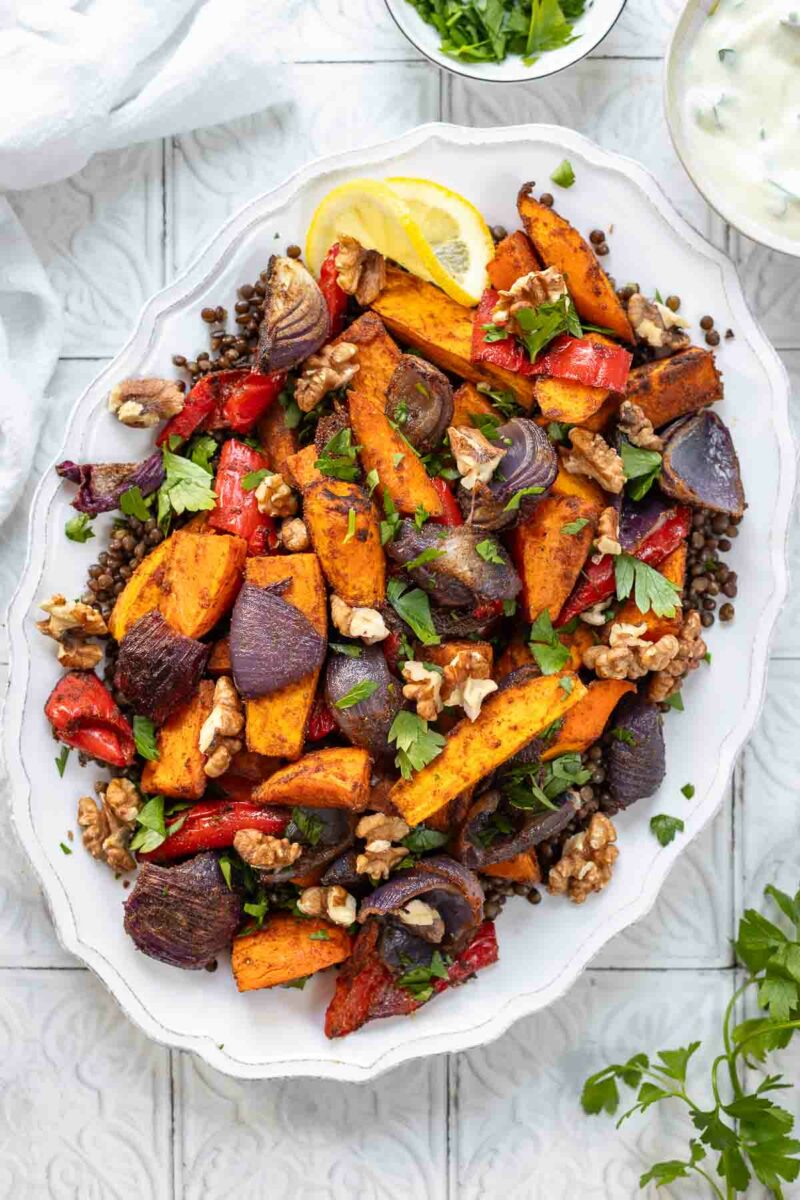 Recipe for Lebanese Roasted Vegetables with Lentils with walnuts, and lemon yogjurt sauce.