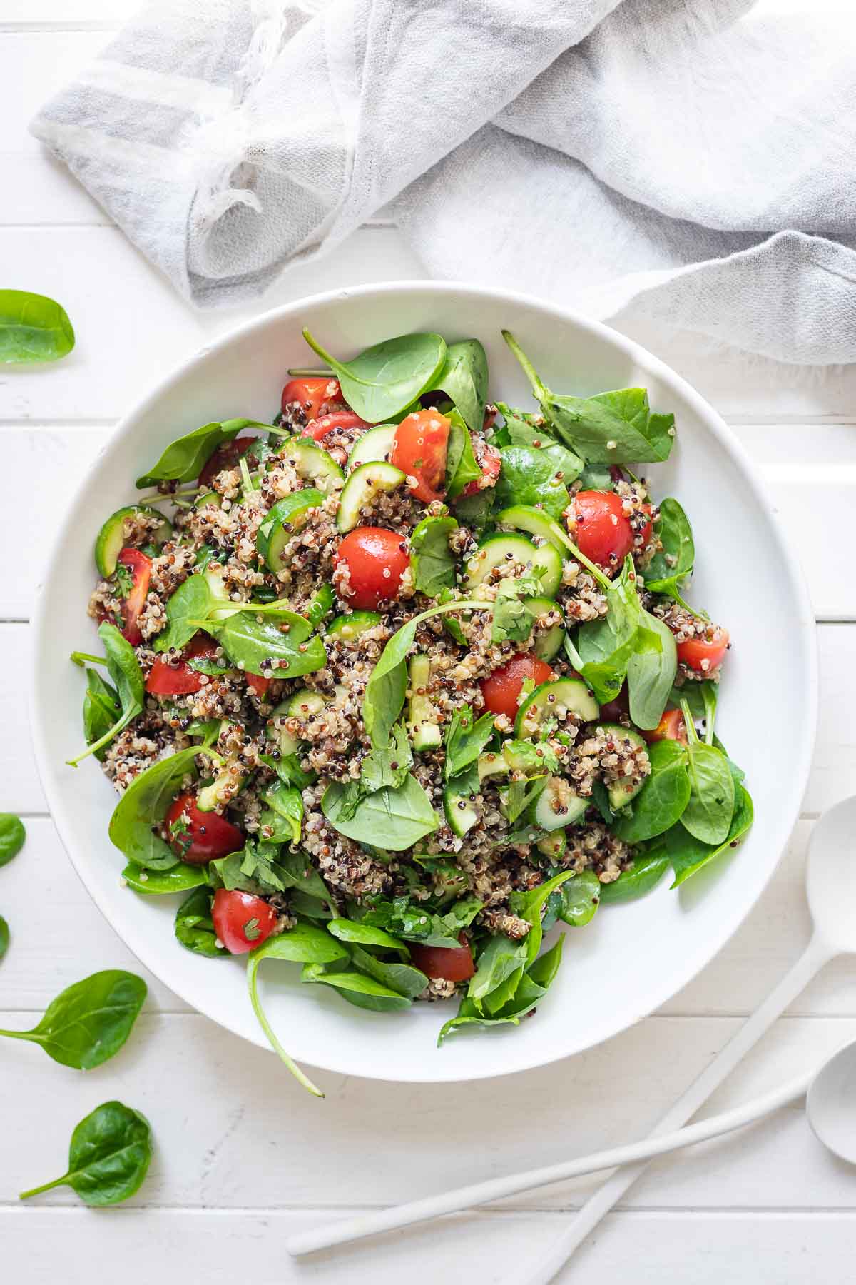 Quinoa Salad With Tomato Cucumber Spinach Recipe Elle Republic