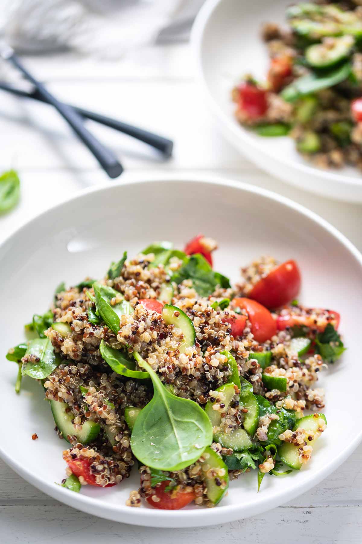 Quinoa Salad With Tomato Cucumber Spinach Recipe Elle Republic