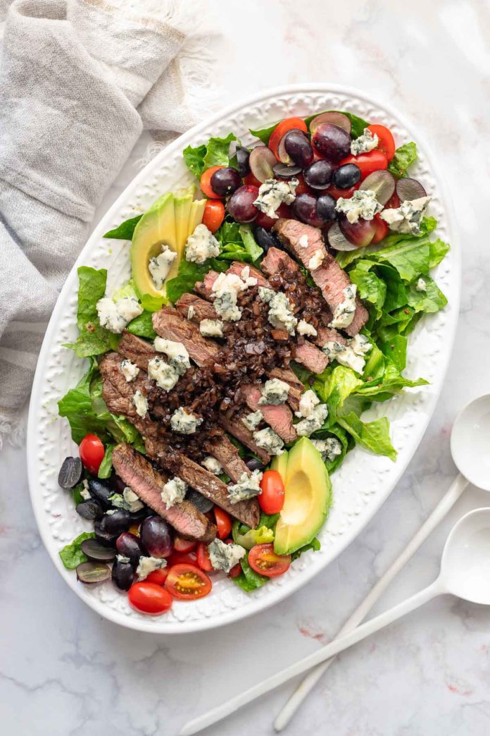 Grilled steak with lettuce and balsamic glaze