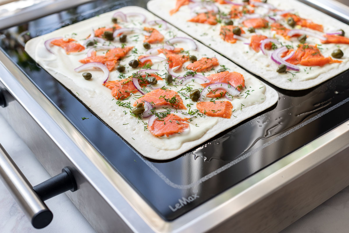 Tarte Flambée with Salmon (Flammkuchen) with capers, dill, red onion on LeMax Grill