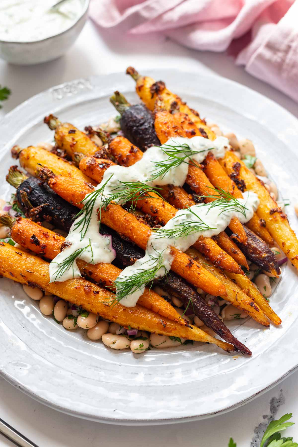 Roasted Carrots with Harissa, Butter Beans and Yoghurt Sauce
