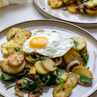 Bratkartoffeln mit Spiegelei, Pilze und Spinat Rezept