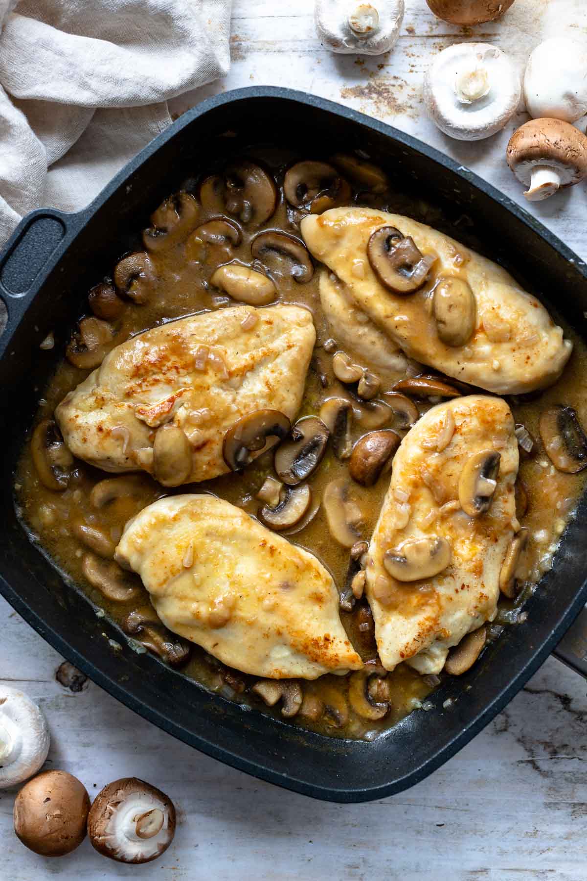 Chicken and mushroom marsala in skillet