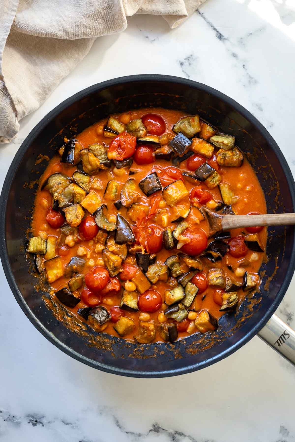 Eggplant stew in wok pan