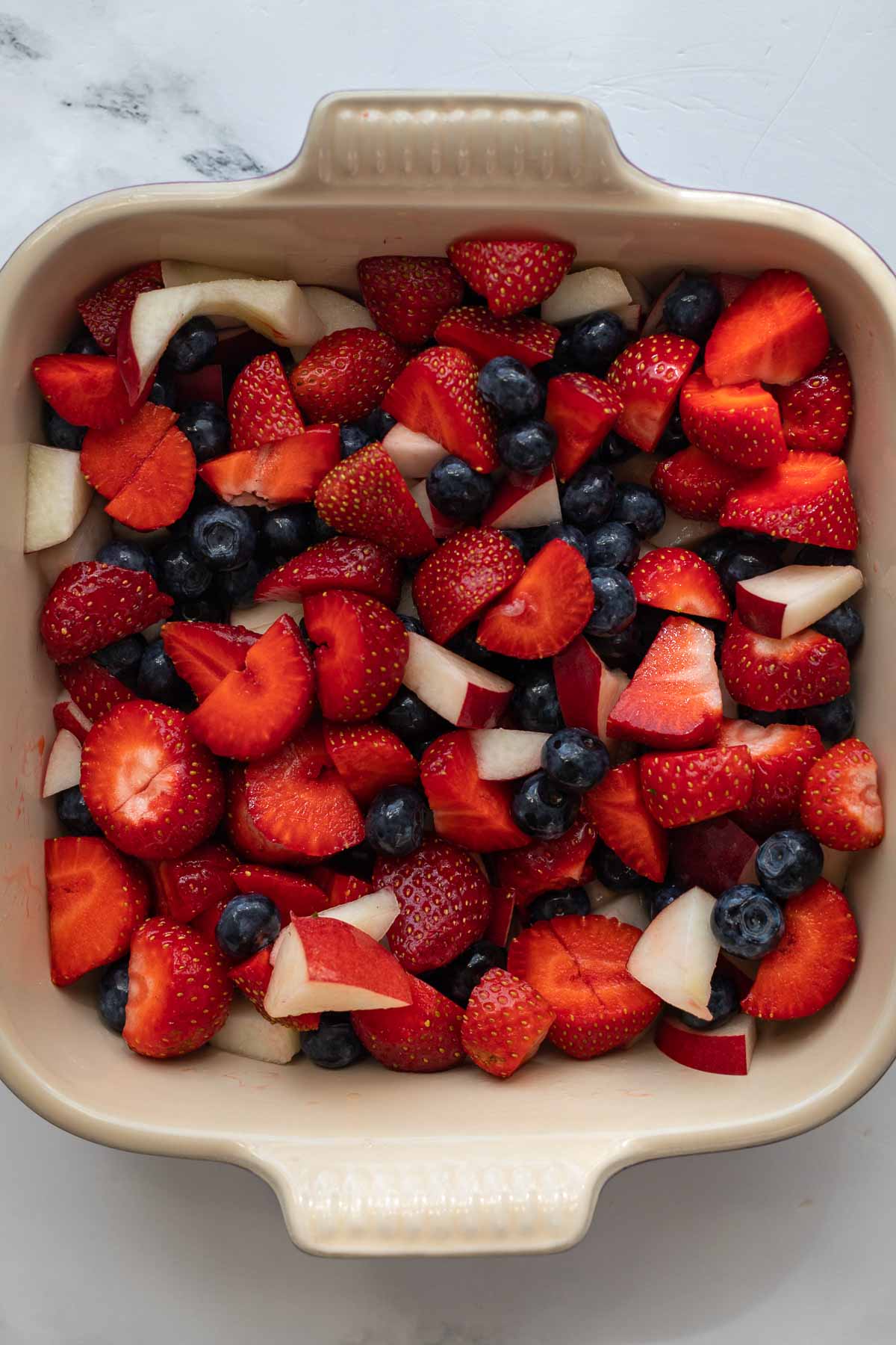 Berries in a ceramic baking dish