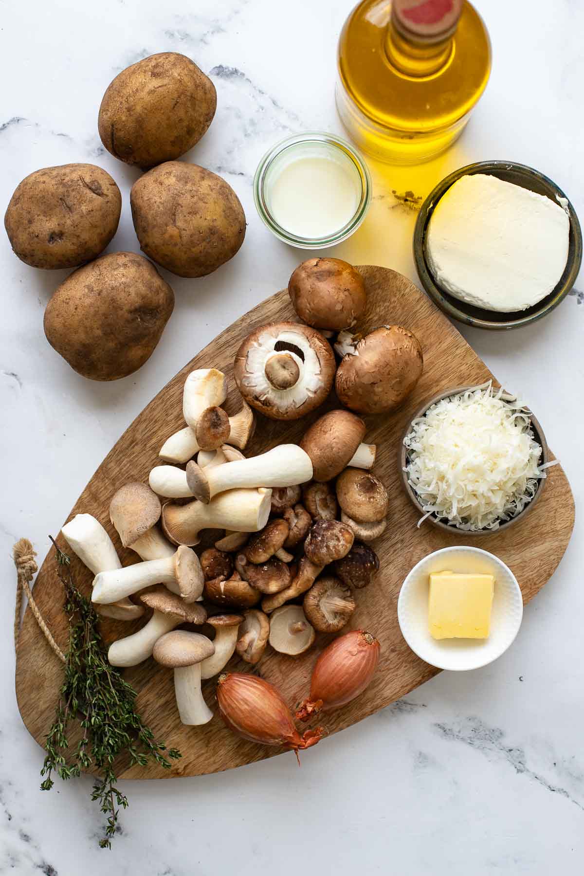 Zutaten für Kartoffel-Pilz-Gratin mit Ziegenkäse