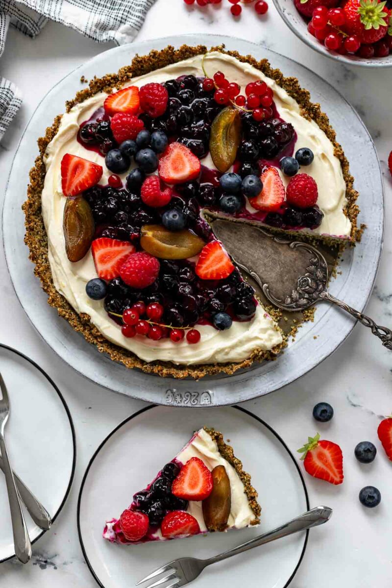 No-bake cheesecake recipe made with condensed milk and topped with berries