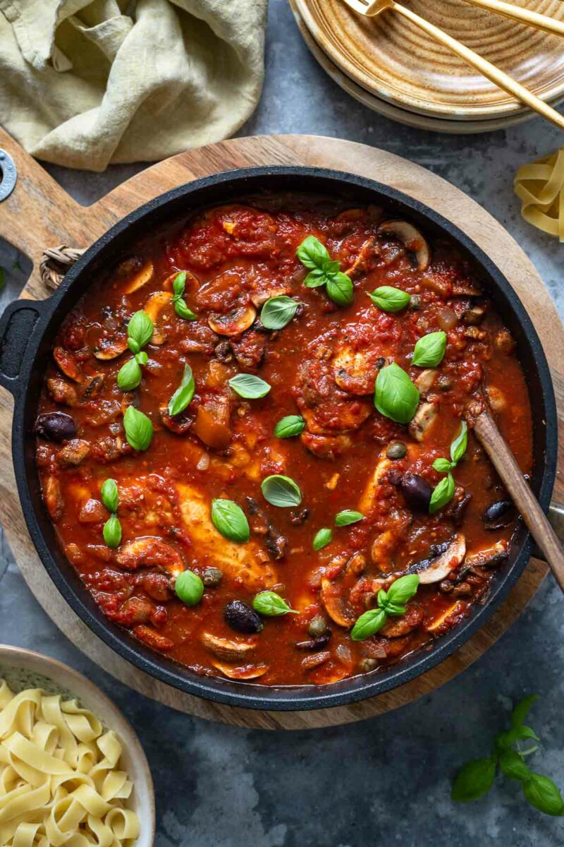 Chicken Cacciatore made with chicken breasts, served with band noodles