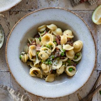 Cremige Zitronenpasta Rezept mit Speck und Erbsen