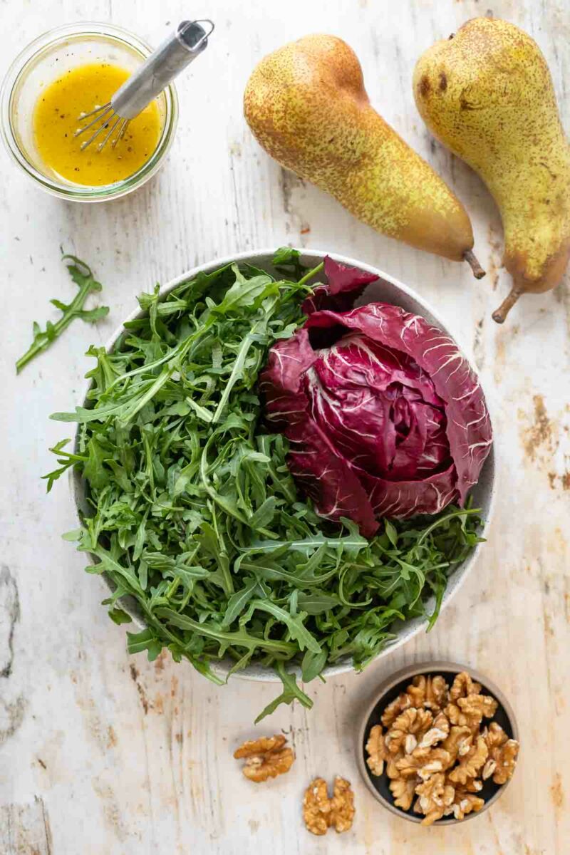 Salad ingredients: Arugula, Pears, Walnuts and Honey-Mustard Dressing