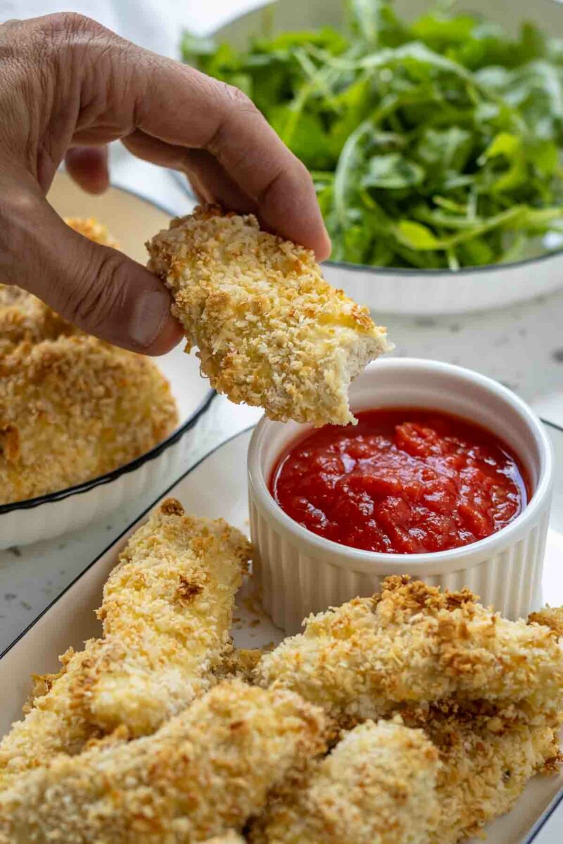 Parmesan-Panko Chicken Tenders (Oven-Baked Recipe) with dip for serving