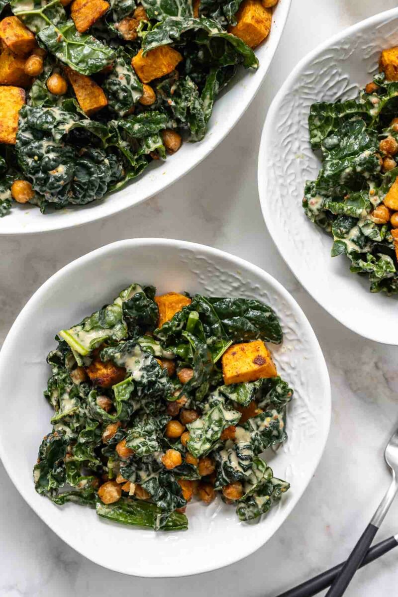 Vegan Kale Caesar Salad recipe with roasted Sweet Potato & Chickpeas and lemon tahini dressing with nutritional yeast for signature flavour