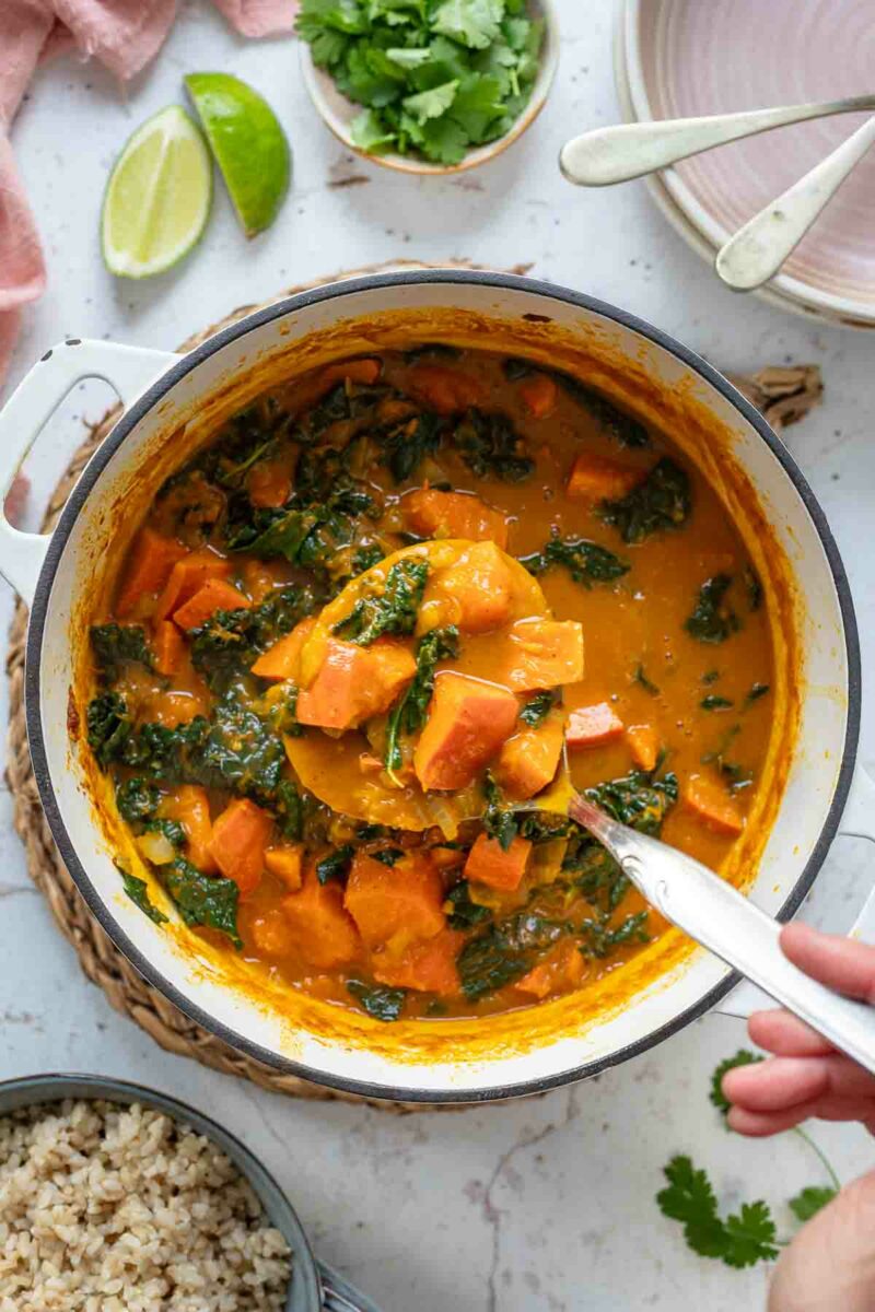 Pumpkin Curry with Red Kuri Squash & Coconut Milk in the pot, ready to serve